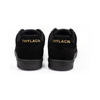 Thylacin Midnight Panther low-top sneakers in all-black suede — heel view of a pair