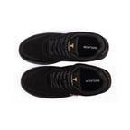 Thylacin Midnight Panther low-top sneakers in all-black suede — top-down view of a pair