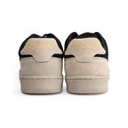 Thylacin Woodland Fox low-top sneakers in black and cream suede — heel view of a pair