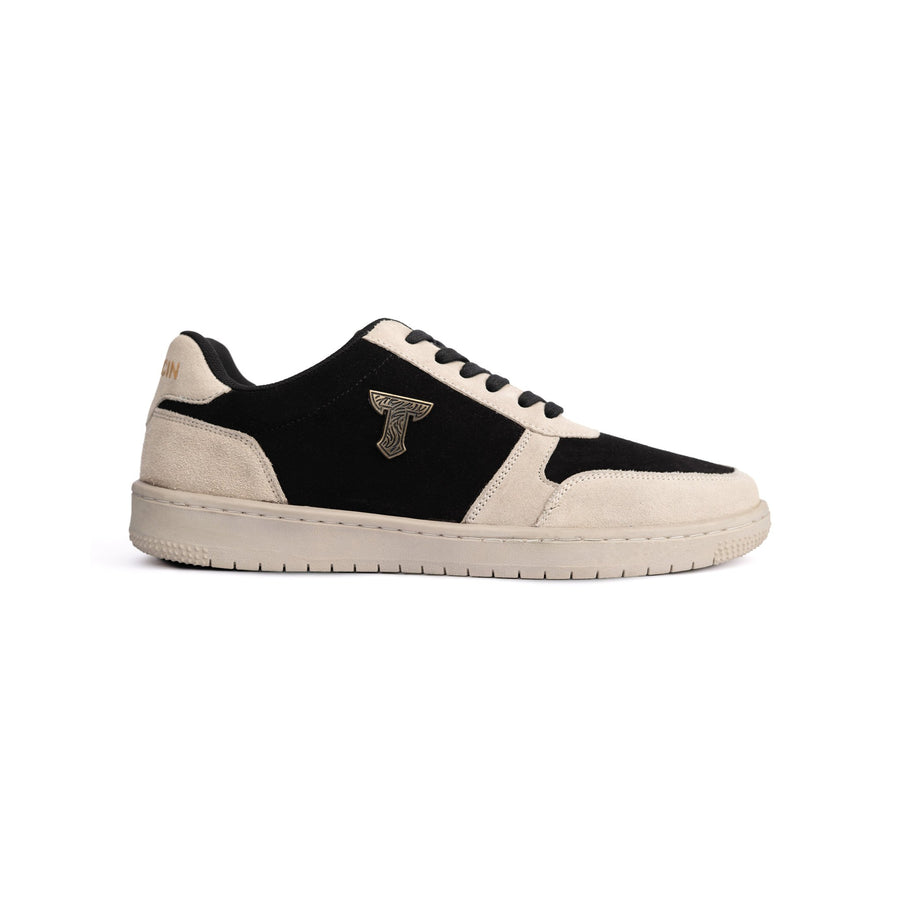 Thylacin Woodland Fox low-top sneaker in black and cream suede — side profile of the shoe